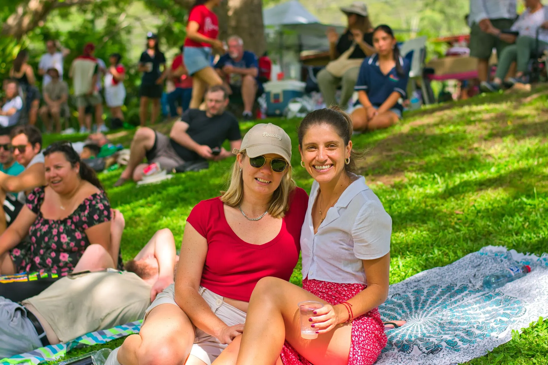 Friends celebrating on the lawn at Historic Rivermill
