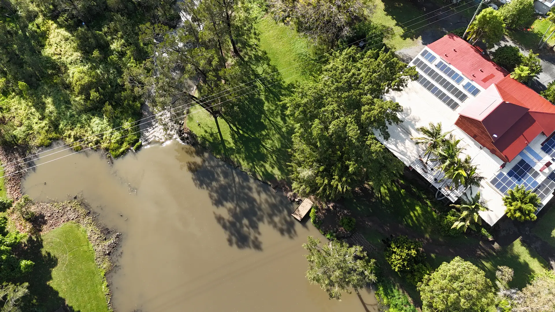 Aerial view of Historic Rivermill beside the Coomera River in the Gold Coast hinterland