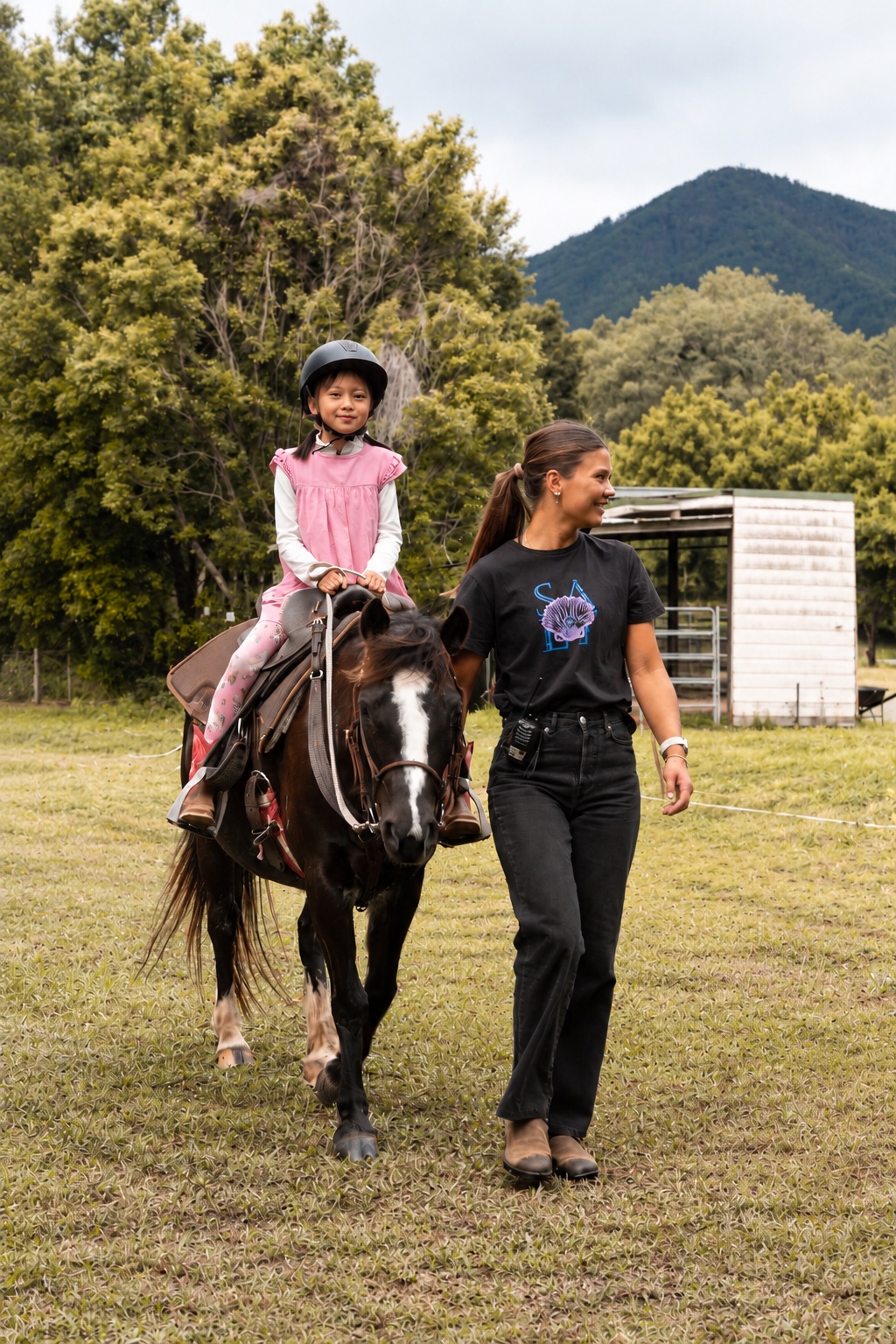 A child on a led horse for an eight-minute ride at Historic Rivermill
